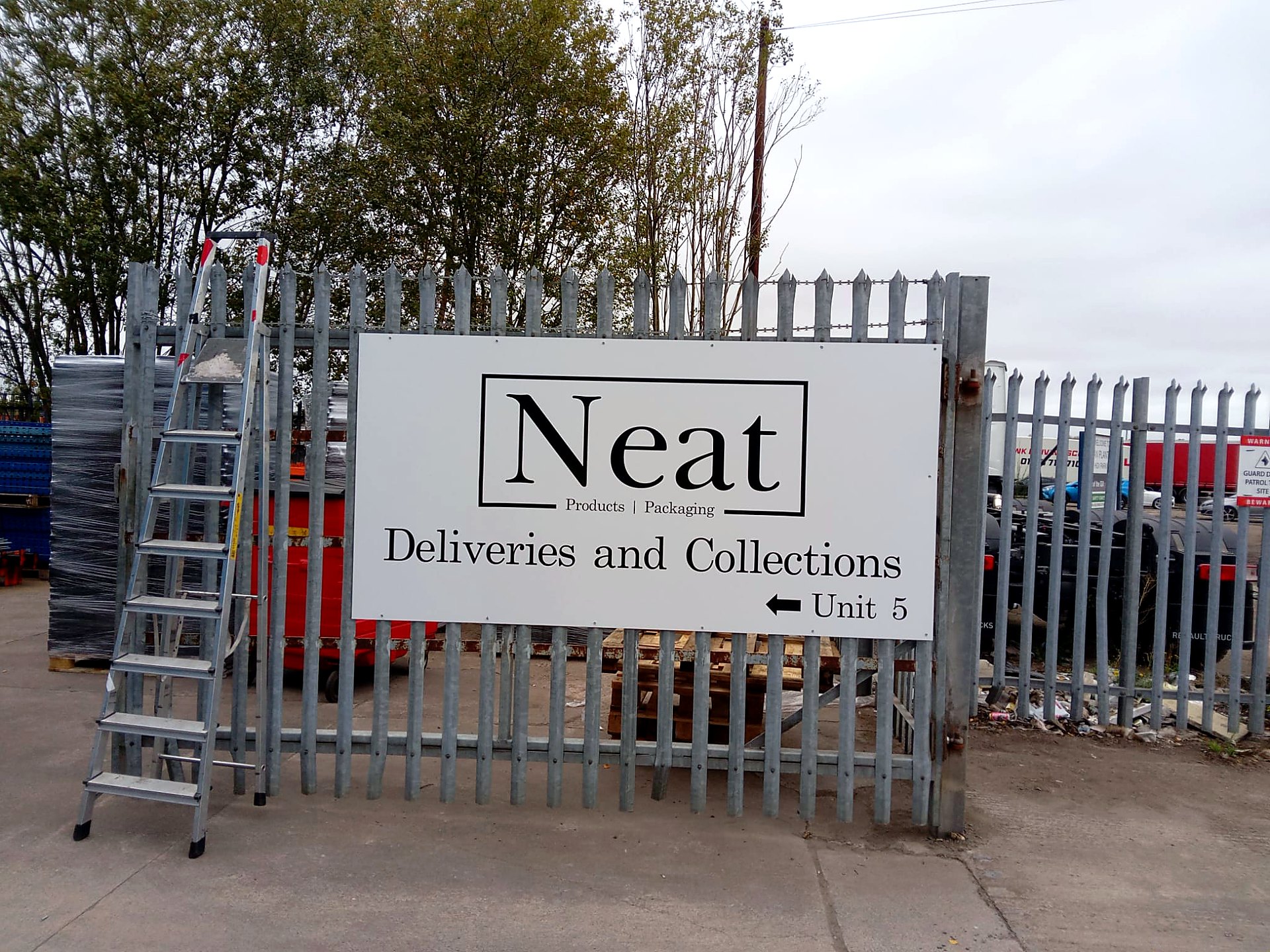 Neat deliveries freestanding sign