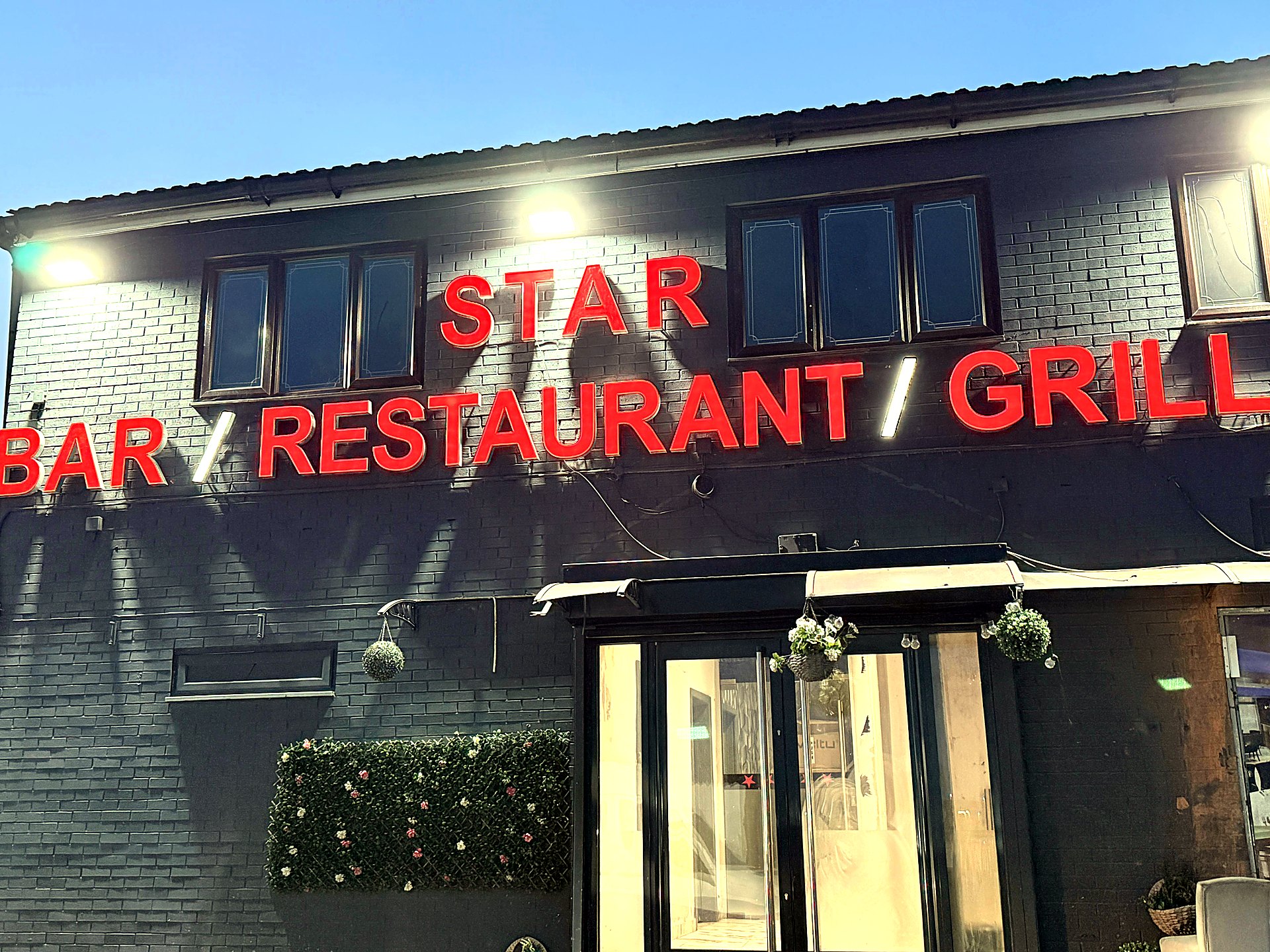 Star Restaurant illuminated letters