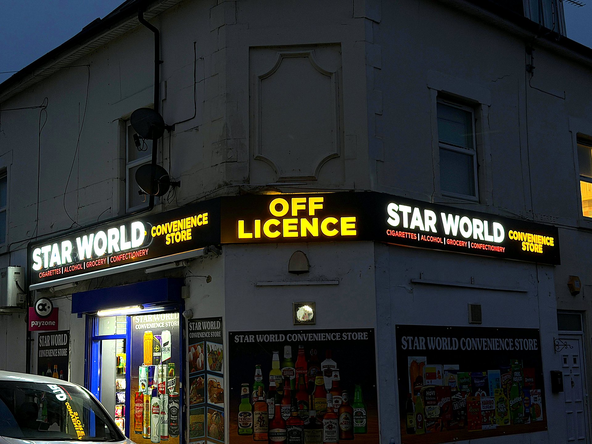 Star World off licence illuminated sign