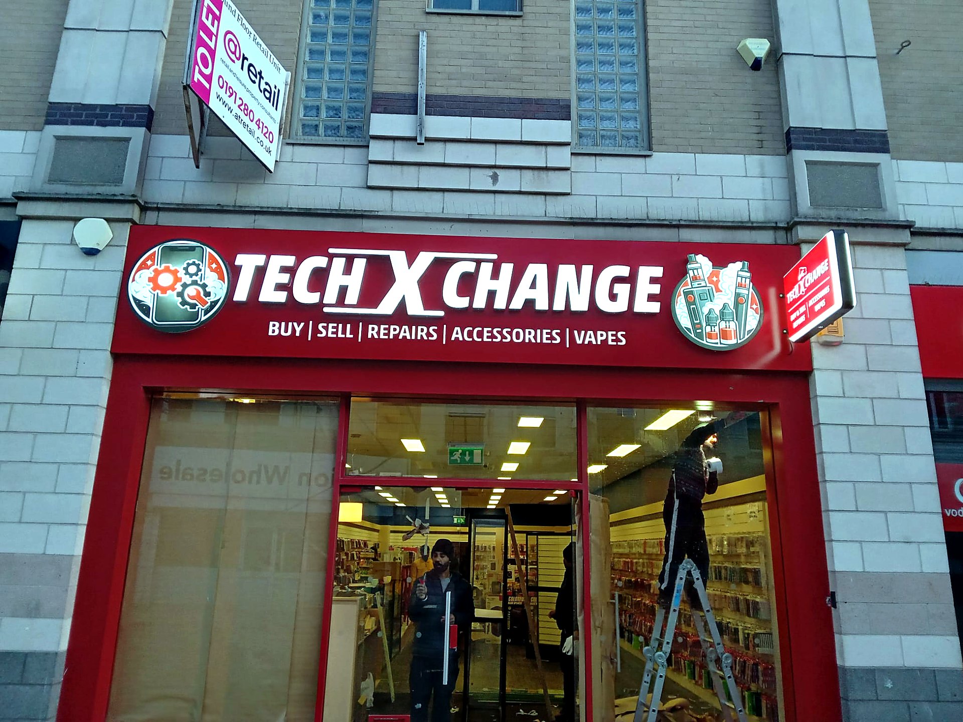Tech X Change shop front signage